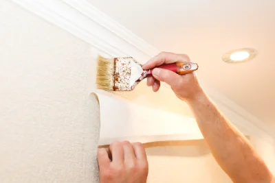Pose de papier peint à Ruages — revêtements muraux et toiles de verre